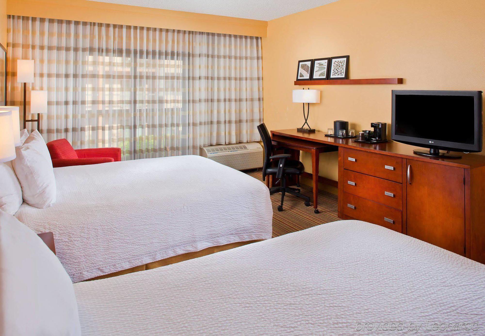 Courtyard By Marriott Orlando Airport Hotel Buitenkant foto