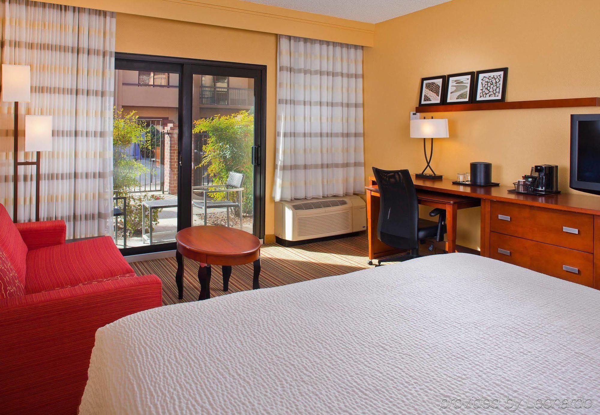 Courtyard By Marriott Orlando Airport Hotel Buitenkant foto